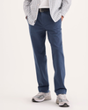 Front view of model wearing Ocean Blue Alpha Chino Pants, Slim Fit.