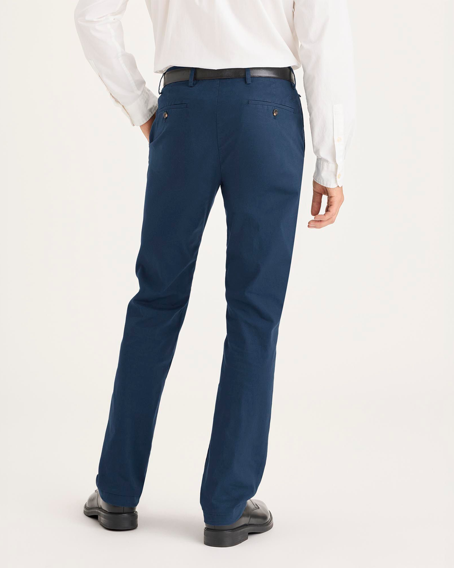 Back view of model wearing Ocean Blue Crafted Khaki Pants, Slim Fit.