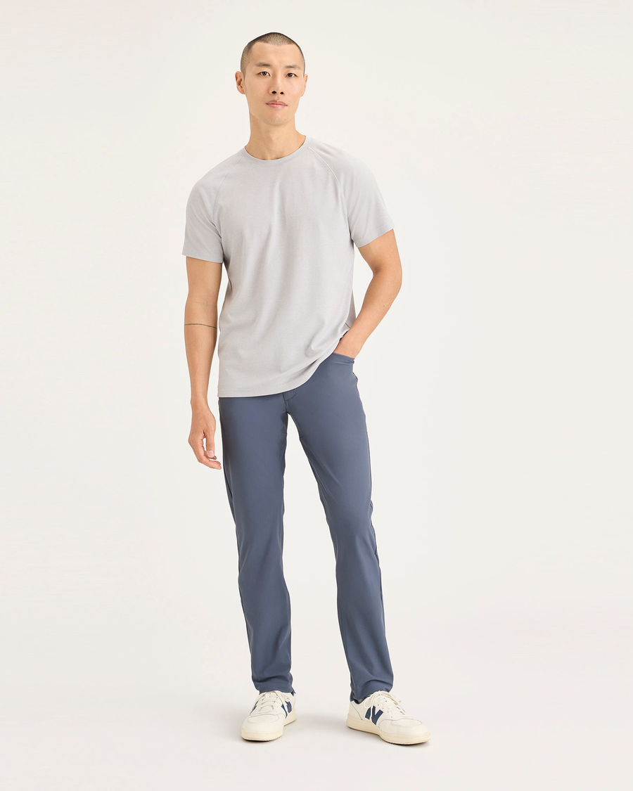 Front view of model wearing Ombre Blue Go Pant, Slim Fit with Airweave.