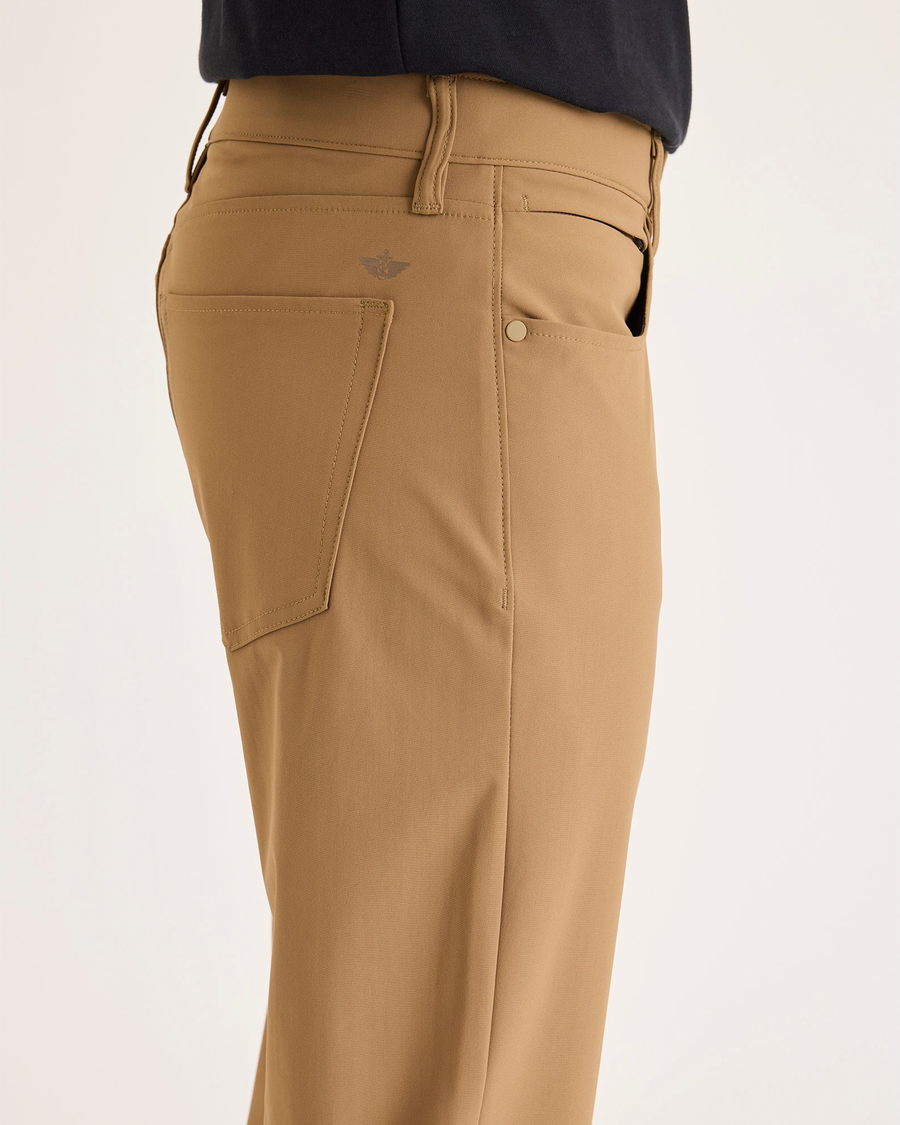 Side view of model wearing Otter Go Pant, Slim Fit with Airweave.