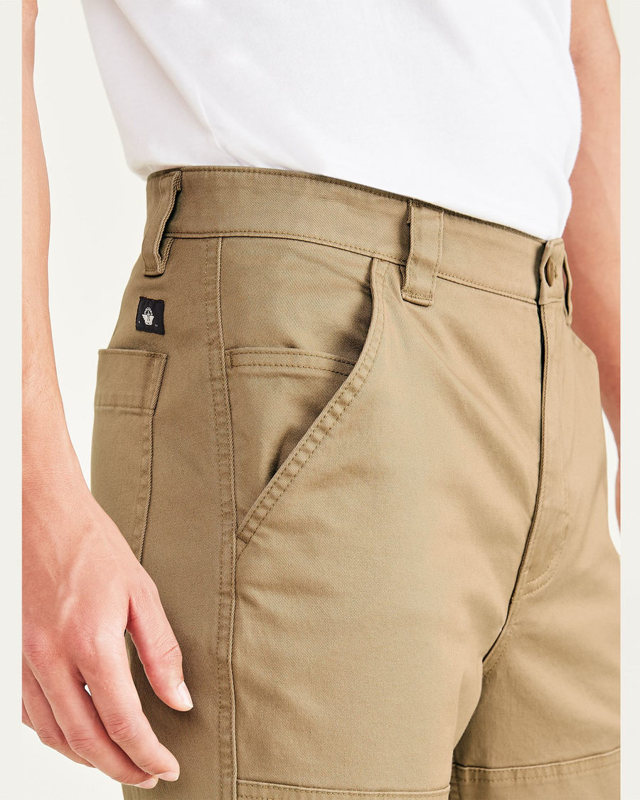 View of model wearing Otter Men's Straight Fit Utility Pants.