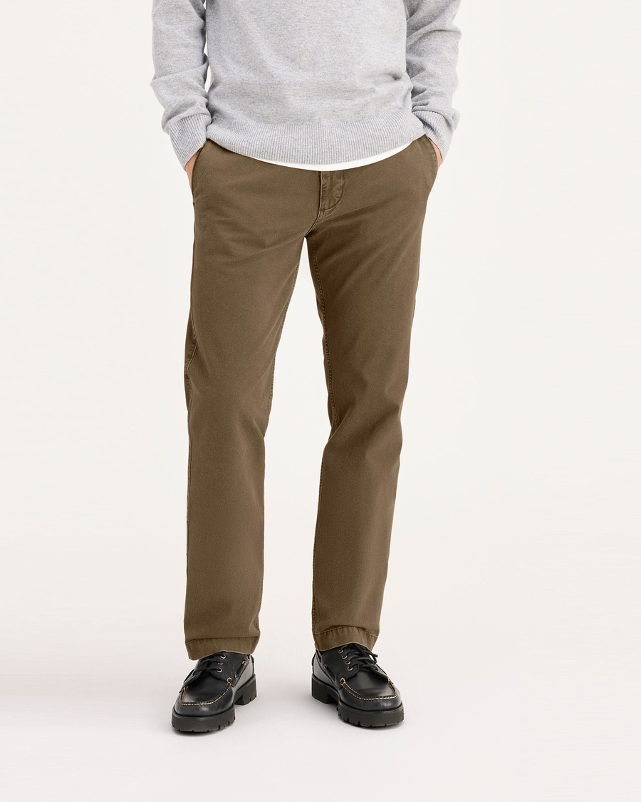 Front view of model wearing Otter Stonewash Men's Slim Fit Smart 360 Flex California Chino Pants.