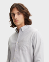 View of model wearing Oxford Medium Grey Heather Men's Slim Fit 2 Button Collar Shirt.