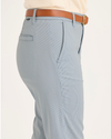 Side view of model wearing Oxnard Tourmaline Stripe Weekend Chino, Slim Fit.