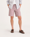 Front view of model wearing Pale Mauve Alpha 8" Shorts.