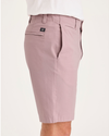 Side view of model wearing Pale Mauve Alpha 8" Shorts.