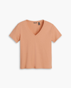View of model wearing Peach Bloom Women's Deep V-Neck Tee Shirt.