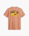 View of model wearing Peach Blossom Men's Slim Fit Logo Tee.