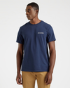 Front view of model wearing Pembroke Men's Slim Fit Logo Tee.