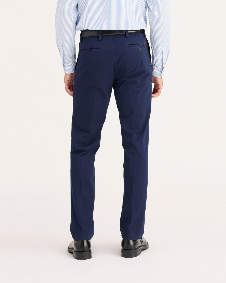 Back view of model wearing Pembroke Men's Slim Fit Smart 360 Flex Workday Khaki Pants.