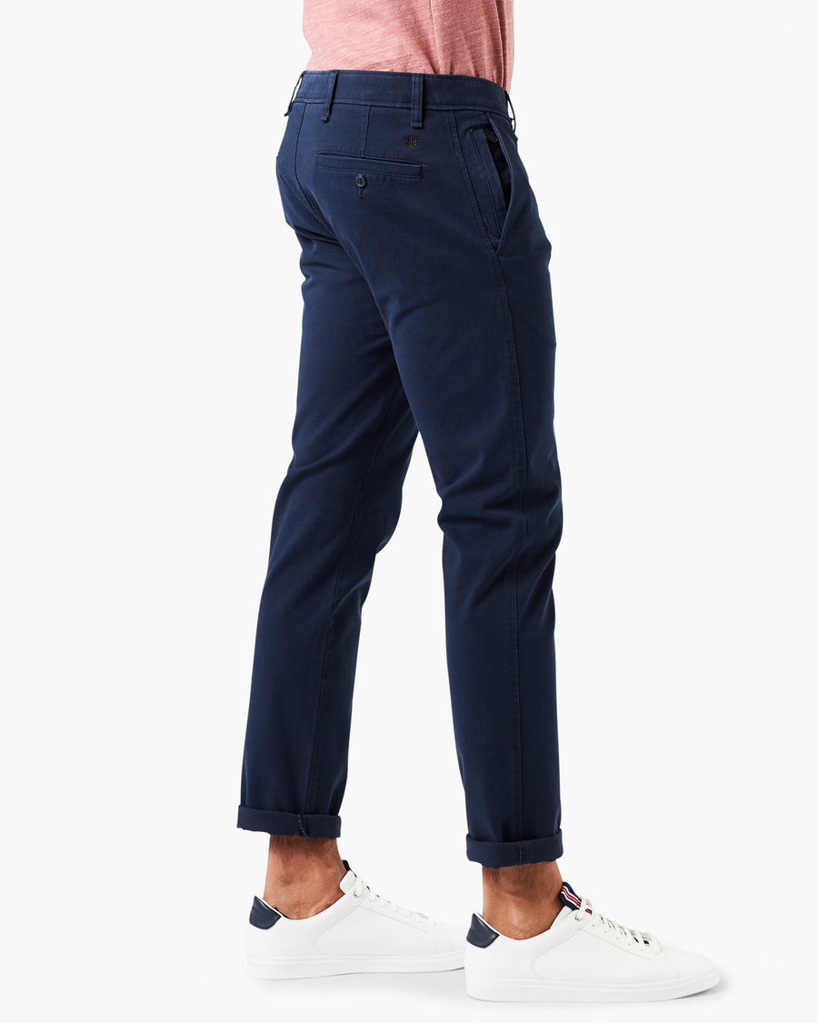 Side view of model wearing Pembroke Ultimate Chinos, Skinny Fit.