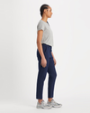 Side view of model wearing Pembroke Women's Slim Fit Weekend Chino Pants.