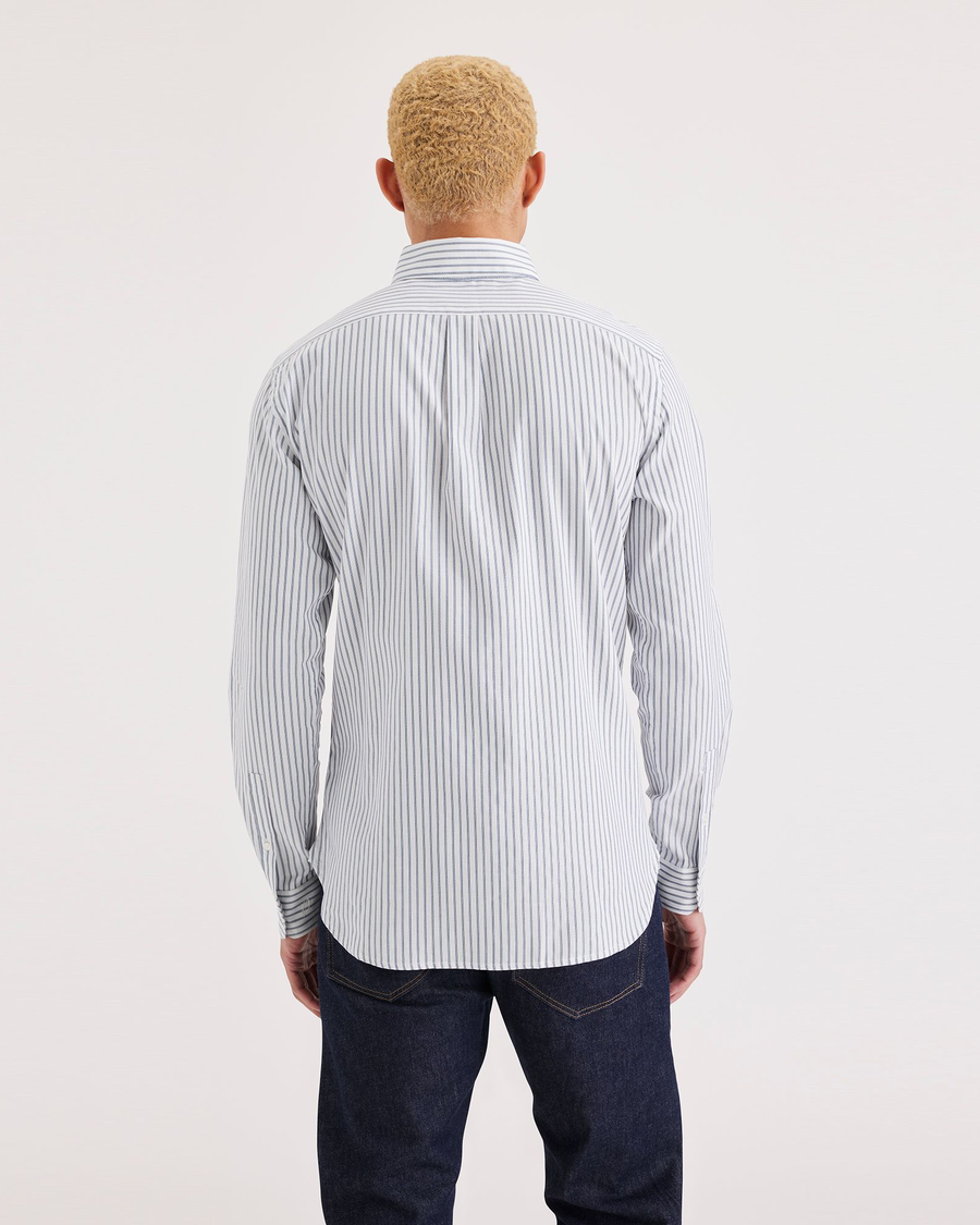 Back view of model wearing Placid Blue Men's Slim Fit Crafted Shirt.