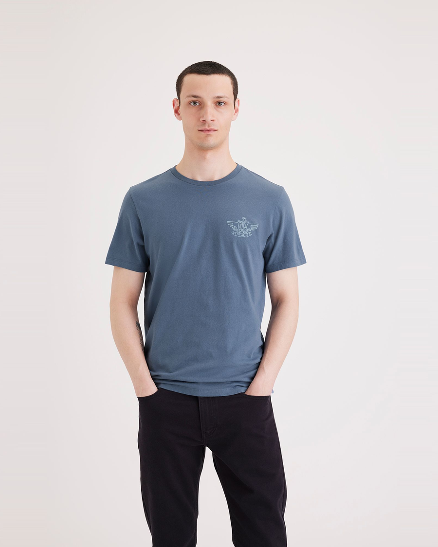 Front view of model wearing Placid Blue Men's Slim Fit Logo Tee.