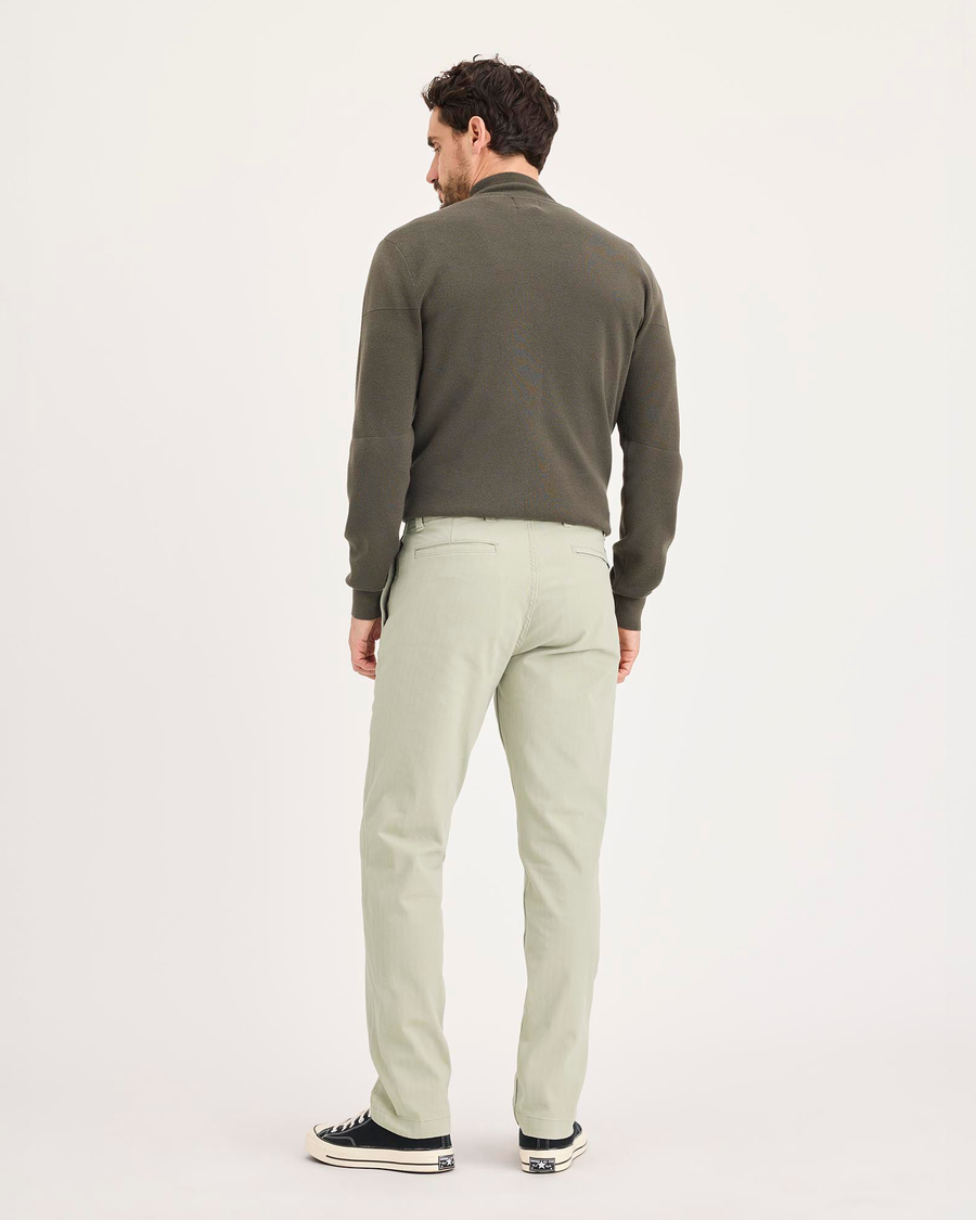 Back view of model wearing Pure Cashmere Alpha Chino Pants, Slim Fit.