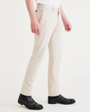 Side view of model wearing Sahara Khaki Alpha Chino Pants, Slim Fit.