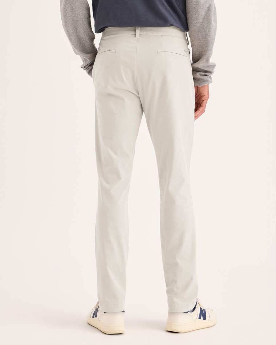 Back view of model wearing Sahara Khaki Go Activeflex Chino, Skinny Fit.