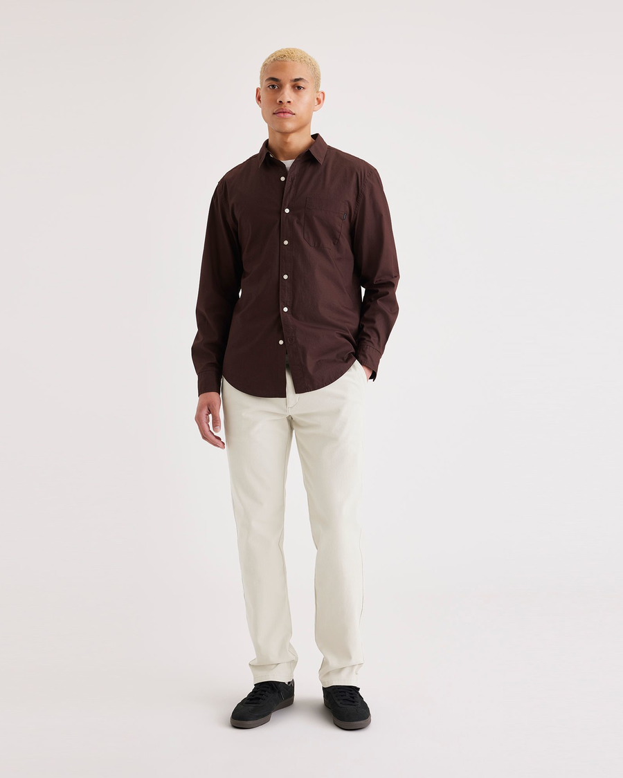 Front view of model wearing Sahara Khaki Men's Slim Fit Smart 360 Flex Ultimate Chino Pants.