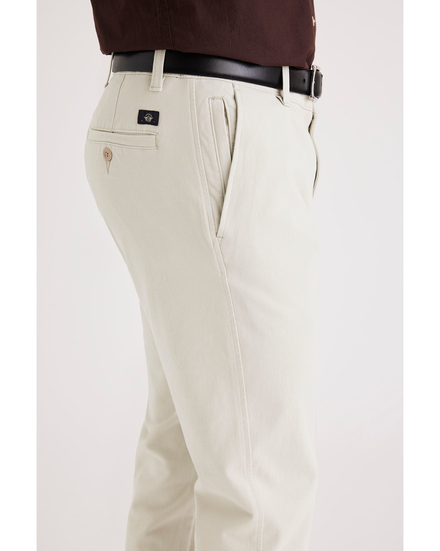 Side view of model wearing Sahara Khaki Men's Slim Fit Smart 360 Flex Ultimate Chino Pants.