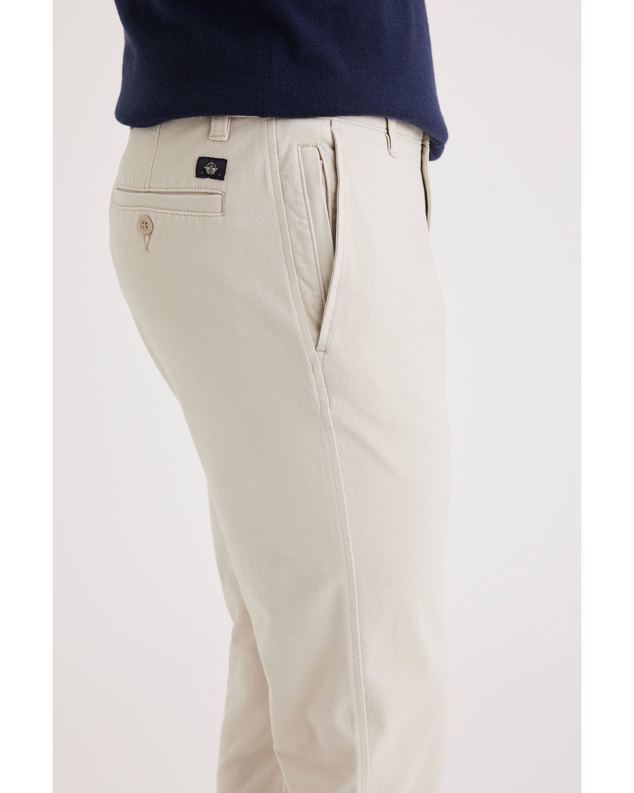 Side view of model wearing Sahara Khaki Men's Smart 360 Flex Ultimate Chino.
