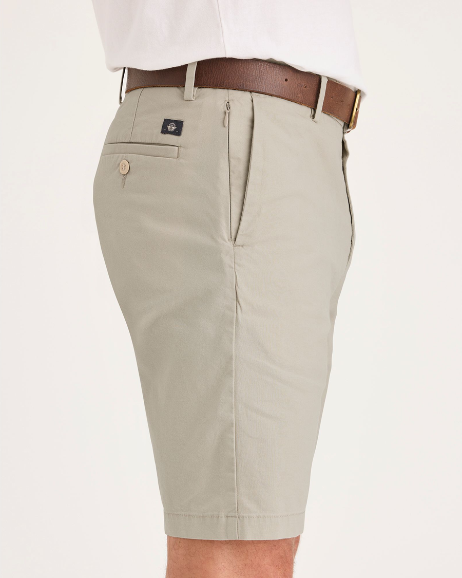 Side view of model wearing Sahara Khaki Men's Supreme Flex Modern Chino Short.