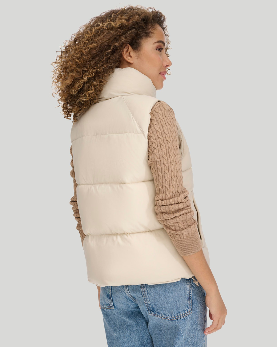 Back view of model wearing Sahara Khaki Women's Puffer Vest Jacket.