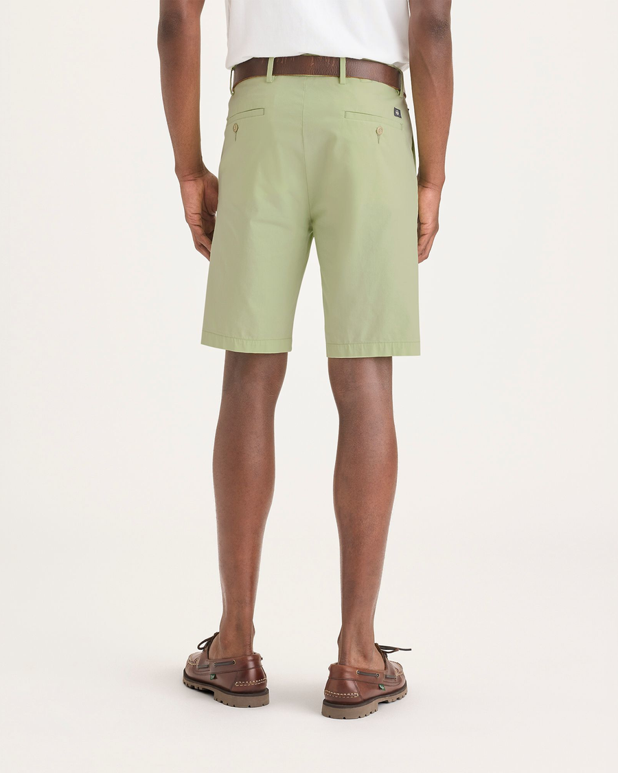 Back view of model wearing Seedling Men's Supreme Flex Modern Chino Short.