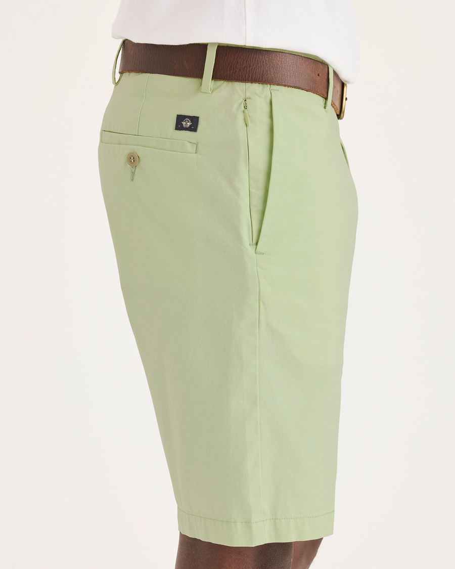 Side view of model wearing Seedling Men's Supreme Flex Modern Chino Short.