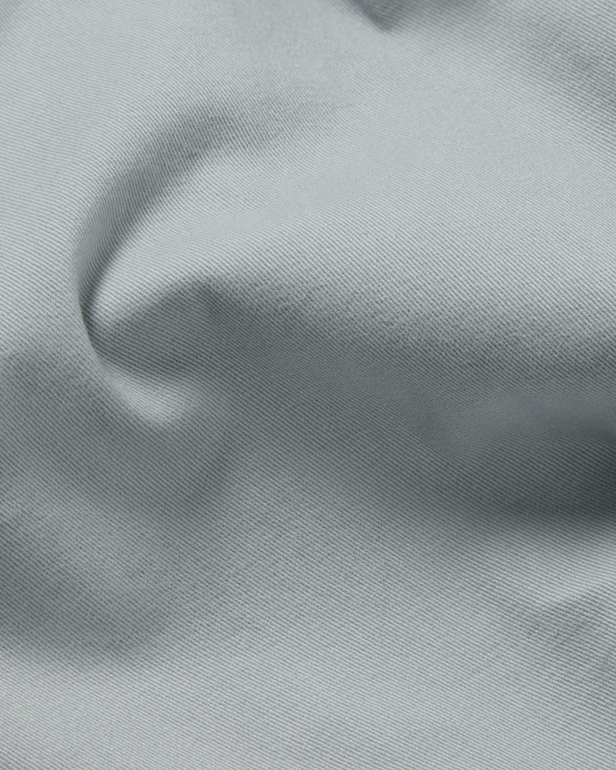 View of model wearing Sharkskin Alpha Chino Pants, Slim Fit.