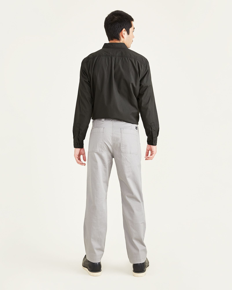 Back view of model wearing Sharkskin Men's Straight Fit Utility Pants.