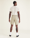 Back view of model wearing Silver Sage Men's Supreme Flex Modern Chino Short.