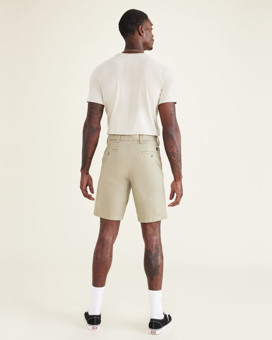 Back view of model wearing Silver Sage Men's Supreme Flex Modern Chino Short.
