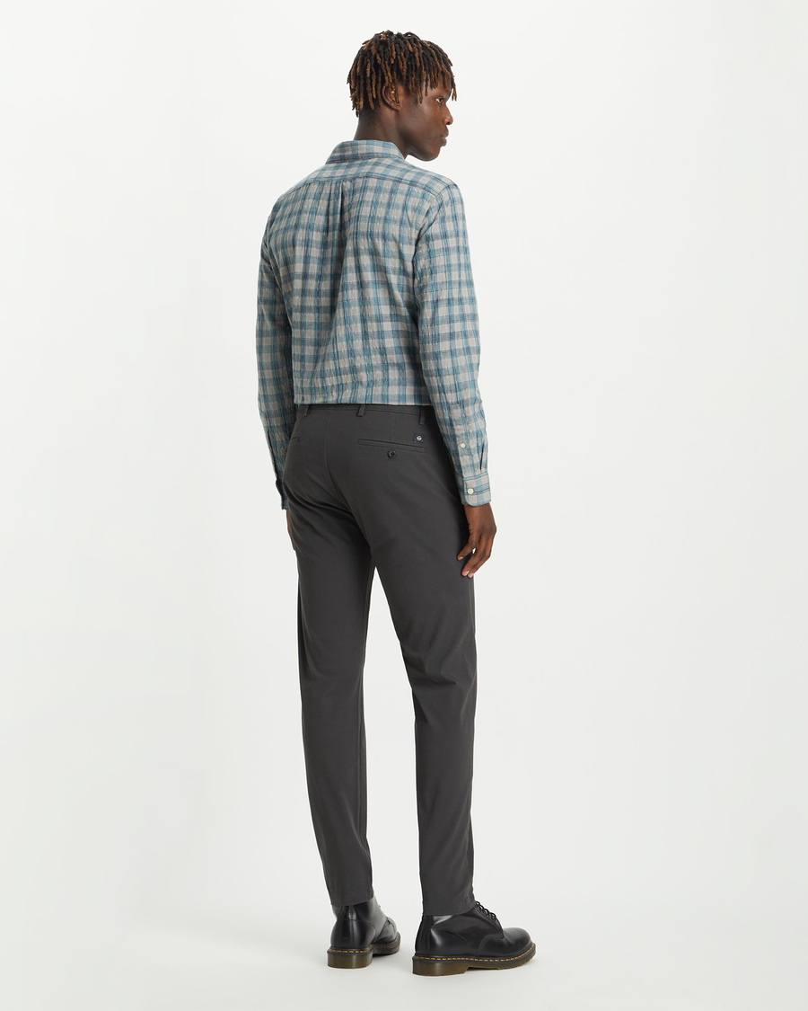 Back view of model wearing Steelhead Crafted Khaki Pants, Slim Tapered Fit.