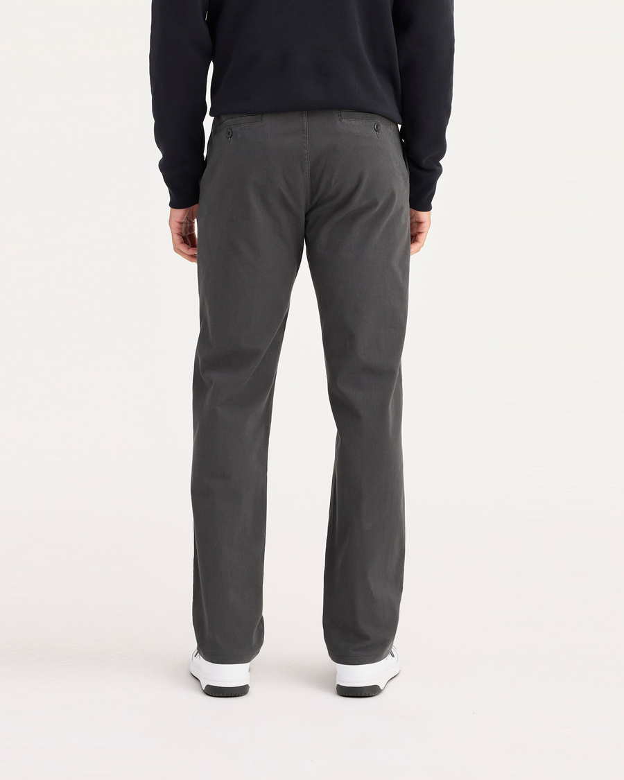 Back view of model wearing Steelhead Ultimate Chinos, Slim Fit.
