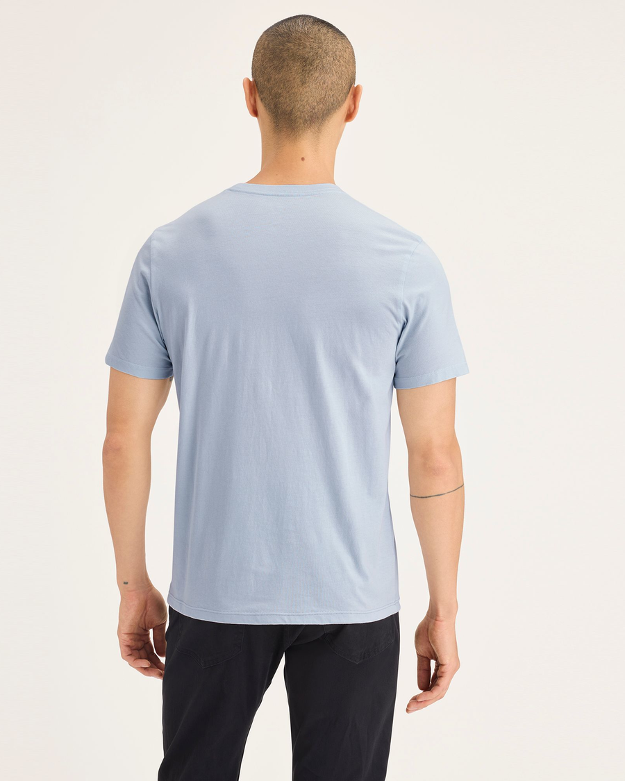 Back view of model wearing Stencil Arctic Ice Men's Slim Fit Logo Tee.