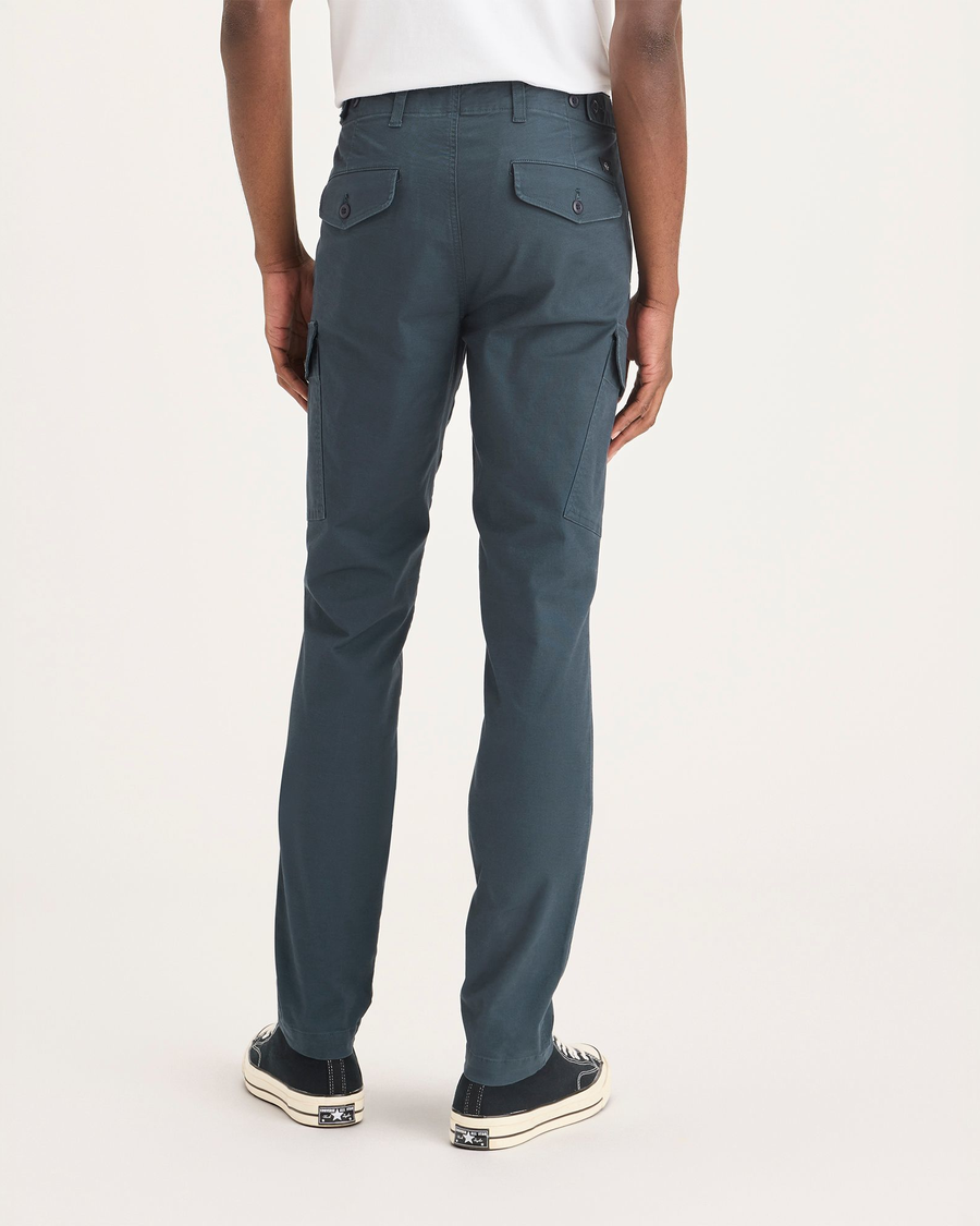 Back view of model wearing Stratified Sea Men's Slim Tapered Fit Cargo Pants.