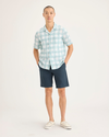 Front view of model wearing Stratified Sea Men's Supreme Flex Modern Chino Short.