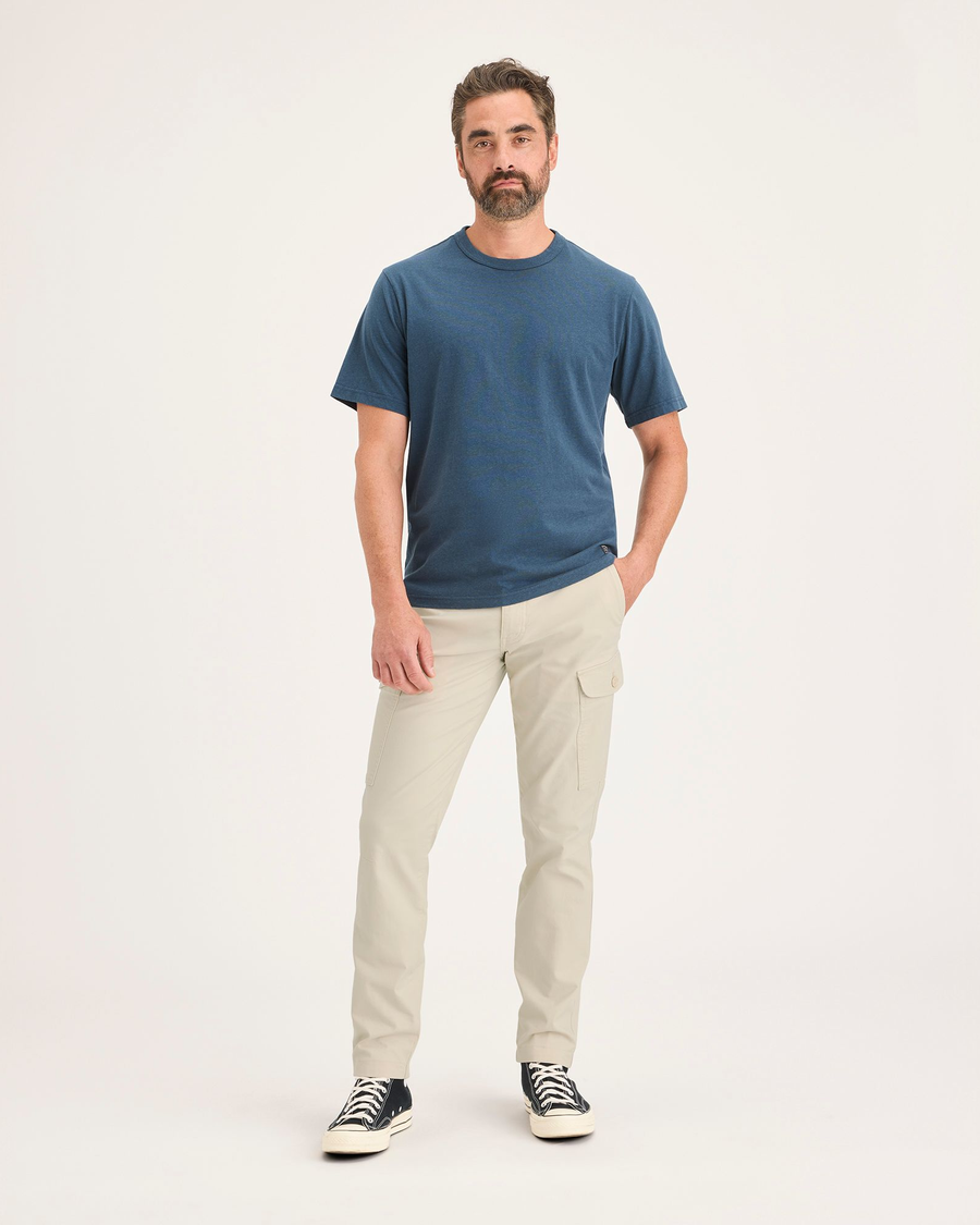 Front view of model wearing Summer Earth Men's Slim Tapered Fit Cargo Pants.