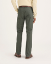 Back view of model wearing Tea Leaf Crafted Khaki Pants, Slim Fit.