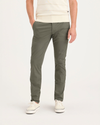 Front view of model wearing Tea Leaf Men's Skinny Fit Original Chino Pants.
