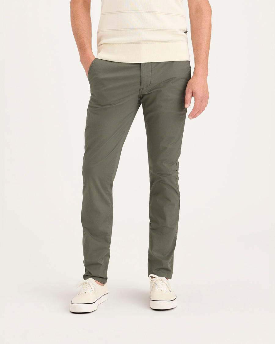 Front view of model wearing Tea Leaf Men's Skinny Fit Original Chino Pants.
