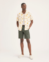 Front view of model wearing Tea Leaf Men's Supreme Flex Modern Chino Short.