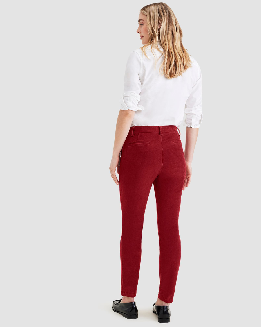 Back view of model wearing Tibetan Red Women's Skinny Fit Chino Pants.