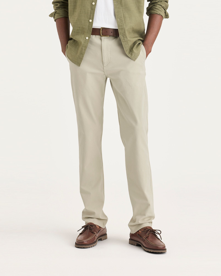 Front view of model wearing Tidal Foam Men's Slim Fit Smart 360 Flex California Chino Pants.