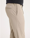 Side view of model wearing Timberwolf Go Chino, Slim Fit with Airweave.