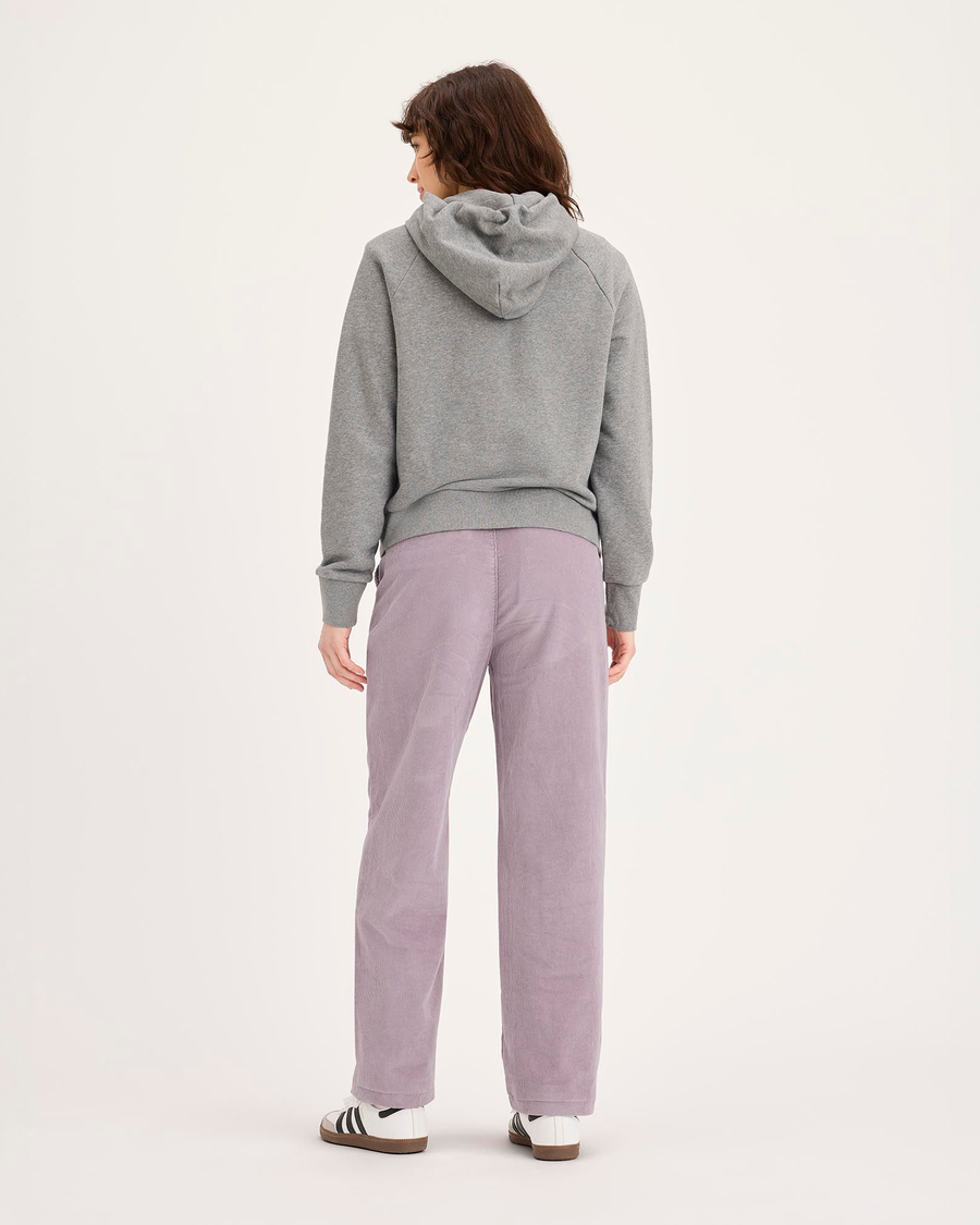 Back view of model wearing Toadstool Blake Chino Pants, High Straight.