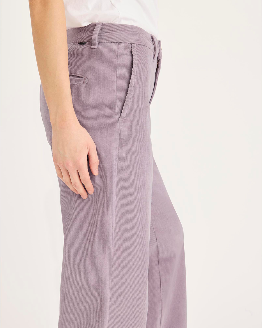 Side view of model wearing Toadstool Blake Chino Pants, High Straight.