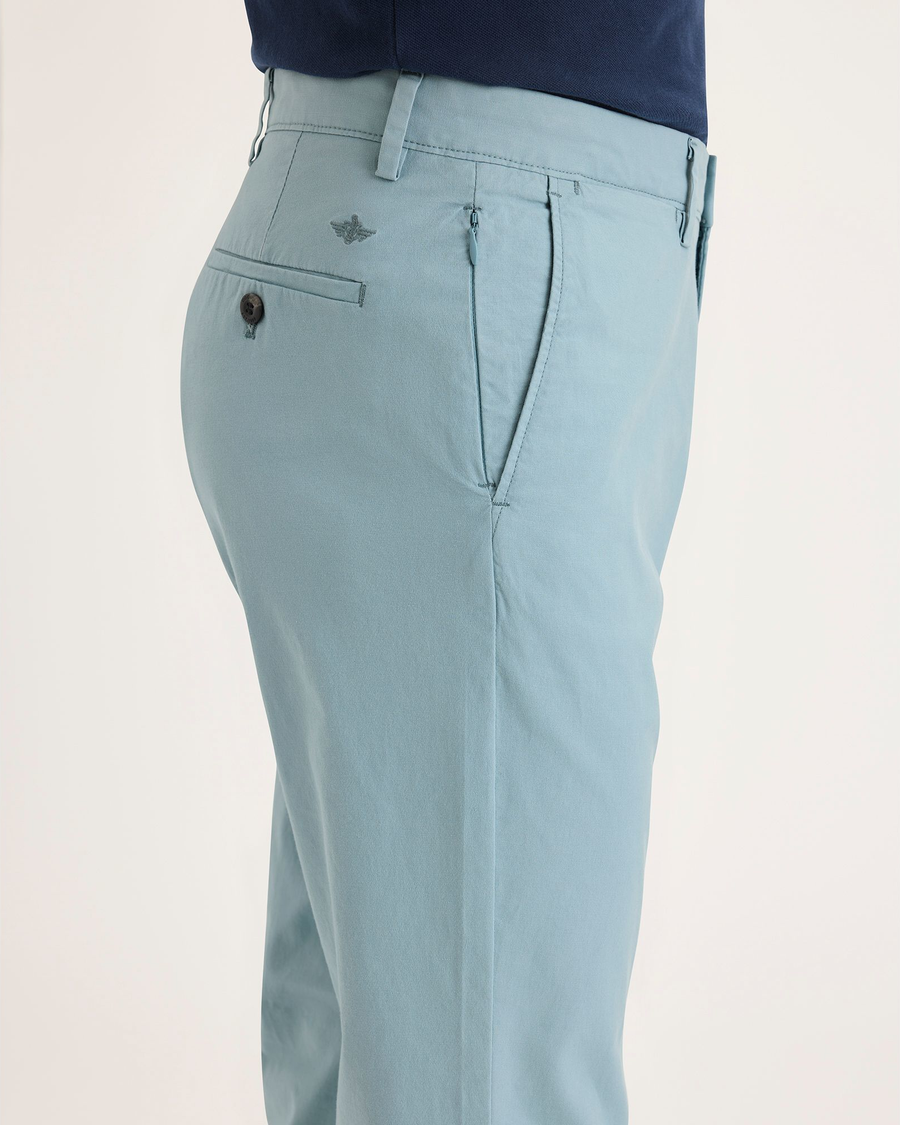 Side view of model wearing Tourmaline Crafted Khaki Pants, Slim Fit.