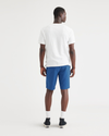 Back view of model wearing True Blue Men's Supreme Flex Modern Chino Short.