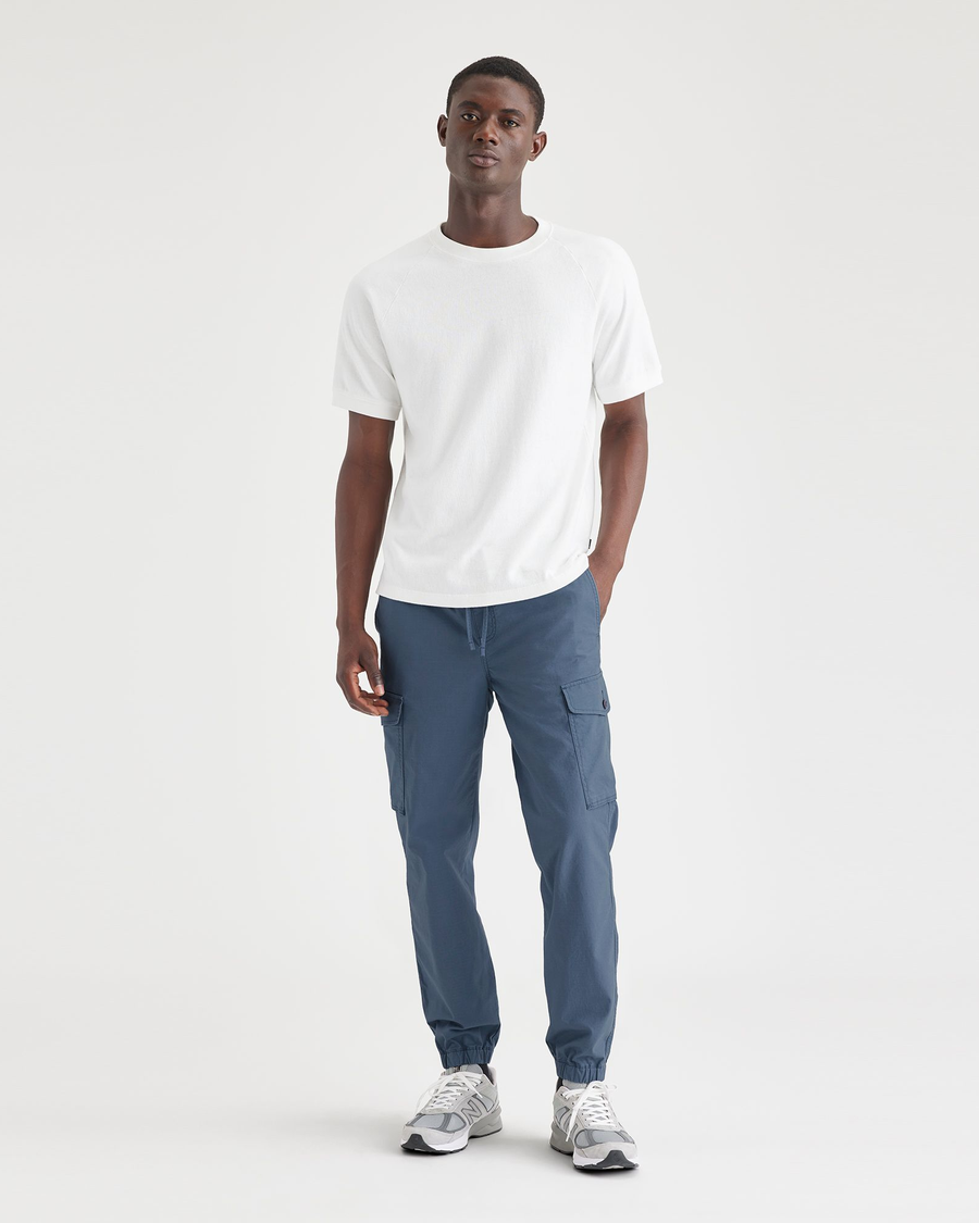 Front view of model wearing Vintage Indigo Men's Straight Tapered Fit Cargo Jogger Pants.